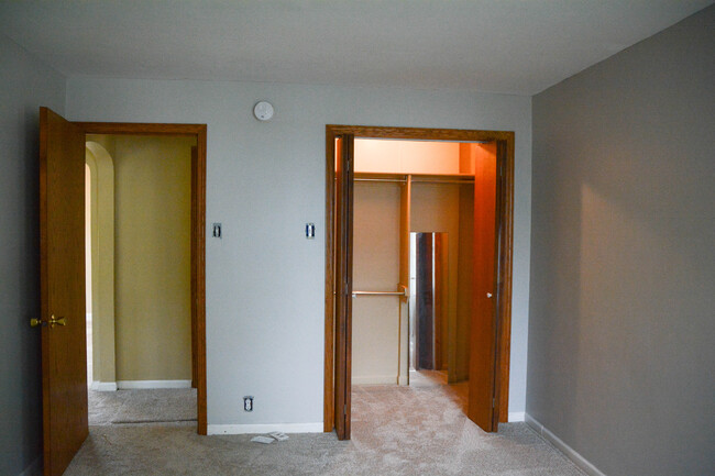 Bedroom with walk-in closet - new flooring and fresh paint - 176 E 35th St