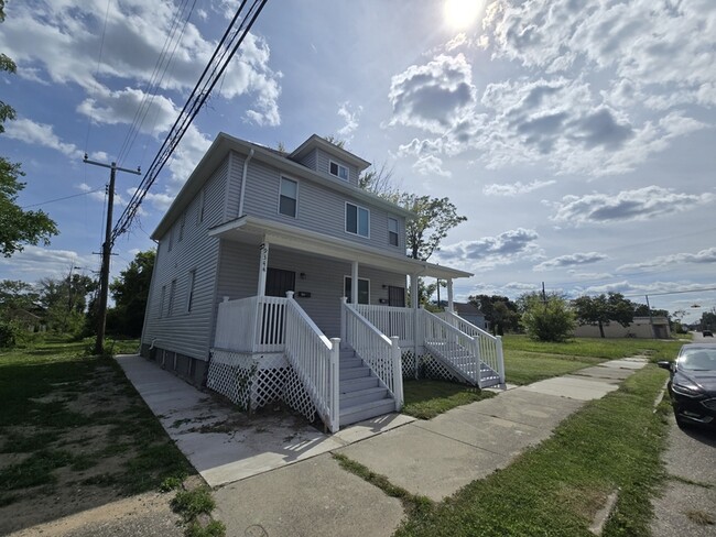 Building Photo - 9340 Moffat Ave