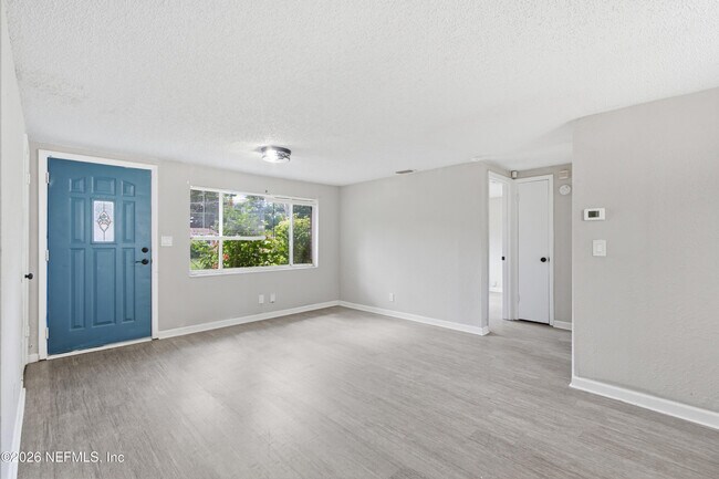 Building Photo - 7386 Dostie Dr E