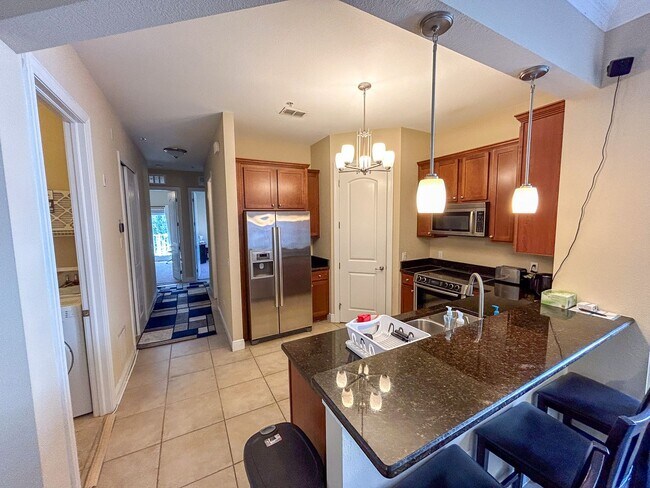 Building Photo - The Palms #302 - Pet Friendly