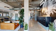 Located on Shattuck Avenue in Berkeley, California, this single-floor communal space exemplifies contemporary industrial design. The lobby entrance welcomes visitors with soaring ceilings that expose structural beams, ductwork, and suspended circular pendant lights, all anchored by polished concrete flooring that runs throughout. Floor-to-ceiling windows along the street-facing façade flood the interior with natural light and provide clear views of the surrounding streetscape.

The main lounge area is thoughtfully furnished with a cognac leather sectional, a deep navy velvet sofa, patterned area rugs, and a wood coffee table, anchored by a large-scale abstract painting. Lush indoor plants, including tall fiddle-leaf trees and potted snake plants, are strategically placed to introduce organic warmth to the industrial setting.

Adjacent to the lounge, a dedicated co-working area features white-topped tables, navy chairs, and a curated gallery wall of abstract blue-and-white artwork against a slate-green accent wall, creating a calm and focused atmosphere.

A mailroom corridor features a full bank of dark mailboxes set against a dramatic black wall adorned with a large botanical mural, complemented by additional sculptural greenery. The overall ambiance balances urban industrial character with curated, residential warmth.