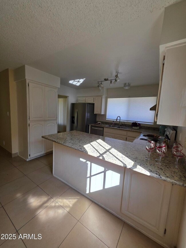 Foto del edificio - 10470 E Clinton St