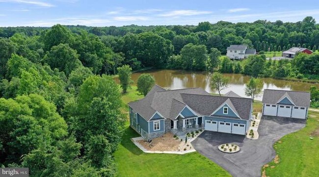Two-acre pond for your viewing and fishing pleasure. - 7704 Loch Lomond Ct