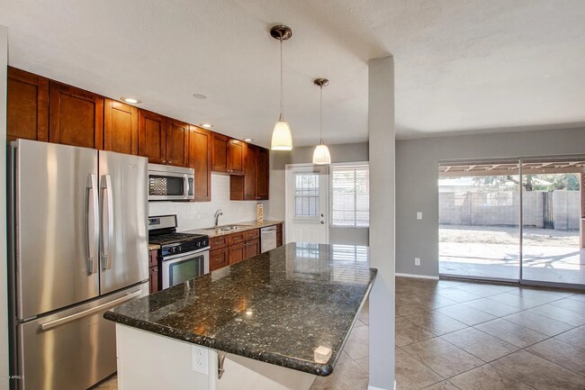 Kitchen from front door - 443 W Mulberry Dr