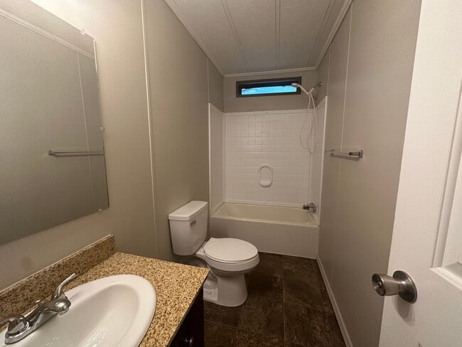 Building Photo - Welcome to this charming 2-bedroom, 2-bath...