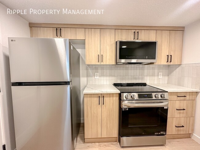 Photo du bâtiment - 50% OFF YOUR FIRST MONTHS RENT! INCREDIBLE...