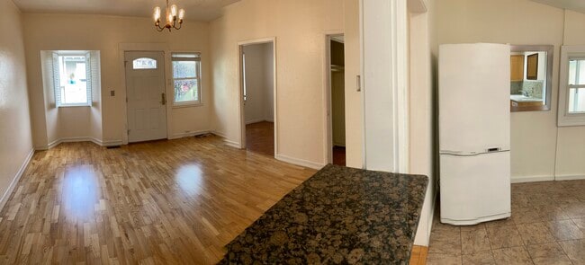 looking from kitchen breakfast bar: living room into kitchen - 436 Anderson St