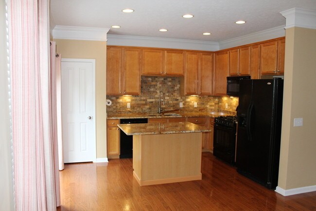 Building Photo - Three Story End Unit Carmel Townhome at Arden