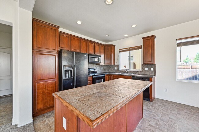 Foto del edificio - 7005 Wood Lily Dr