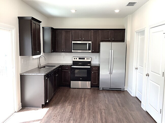 Foto del edificio - 10316 Riverwalk Ct