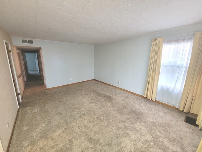 Building Photo - 5836 S Sayre Ave
