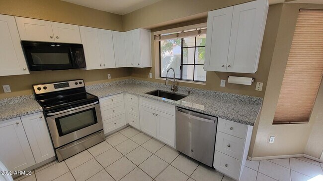 Building Photo - 1227 E Michelle Dr