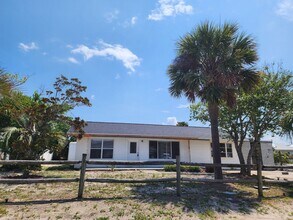 Building Photo - 5104 Beach Dr