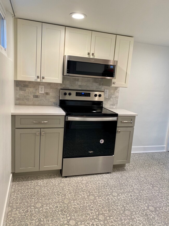 New appliances, cabinets & kitchen floor - 266 Douglas St