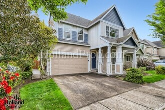 Building Photo - 574 NE 61st Ave