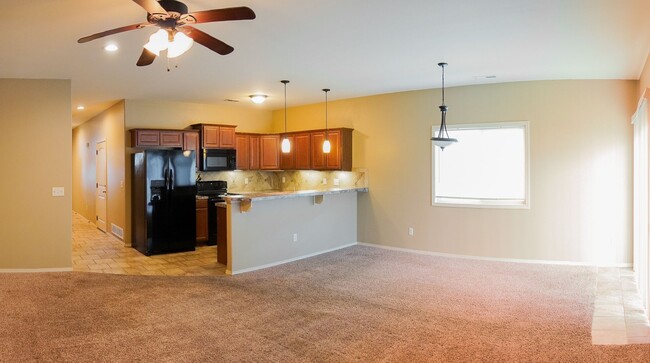 Building Photo - 3-Bed Duplex w Garage + Fenced Yard