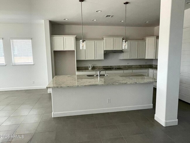 Building Photo - 9931 E Tesla Ave