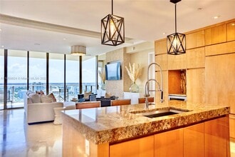Building Photo - 9701 Collins Ave