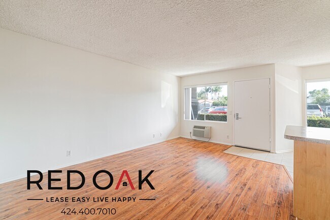 Building Photo - Cozy Jr One Bedroom with Kitchen Appliance...