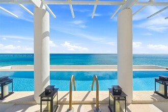 Building Photo - 5801 Collins Ave