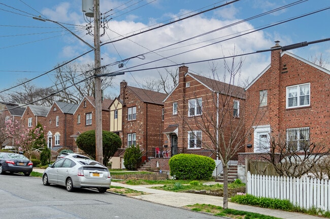 Houses such as these detached single family red brick homes are common in North Riverdale.