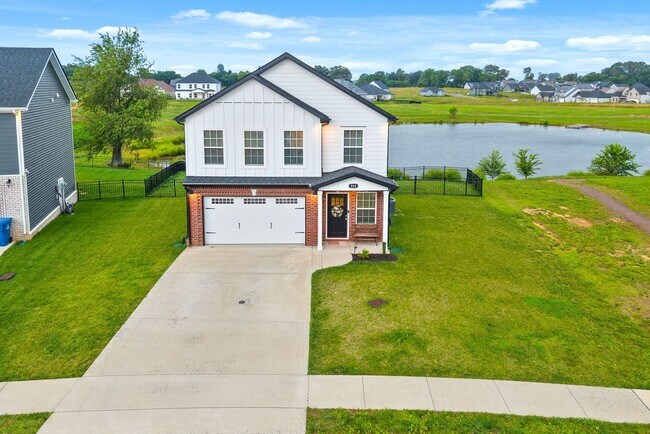 Building Photo - Stocked Pond, Walking Trails and More!!