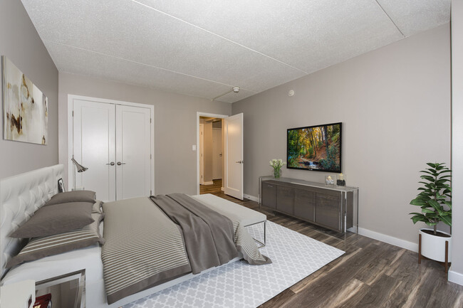 Bedroom With Wooden Flooring - Village At Brookline