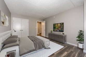 Bedroom With Wooden Flooring - Village At Brookline