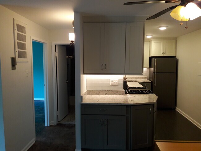 Kitchen and hallway to bedroom and bathroom - 575 Thayer Ave #501