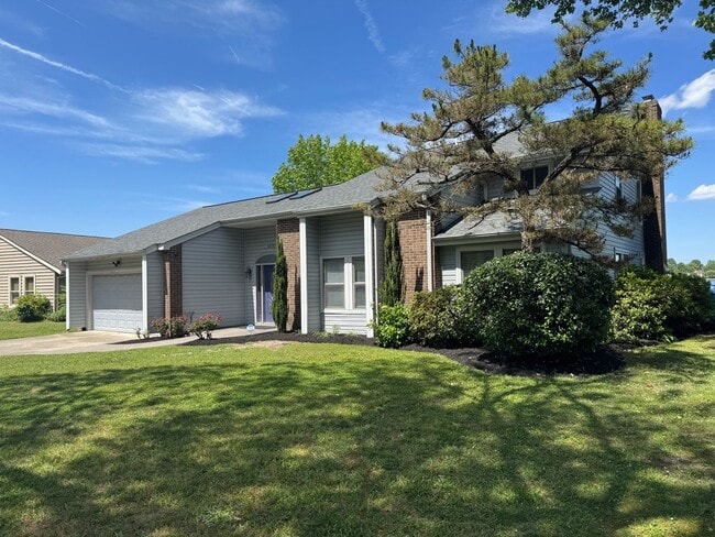 Building Photo - Lake Front Living-Four Bedroom Three and a...