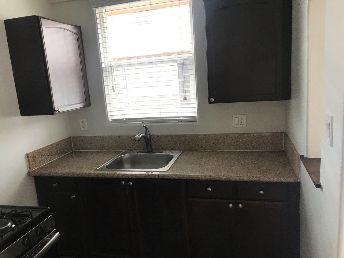clean countertops with garbage disposal - 7575 El Cajon Blvd