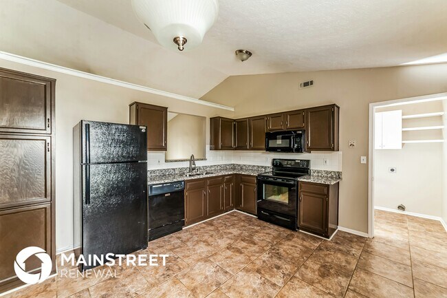 Foto del edificio - 9625 Combs Ln