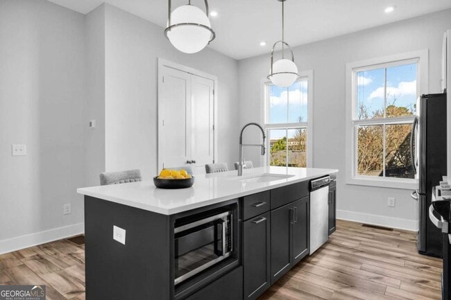 Building Photo - Beautiful West Midtown Townhome Available Now