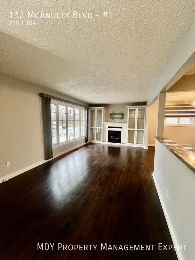 Building Photo - Check out this stunning upstairs apartment!