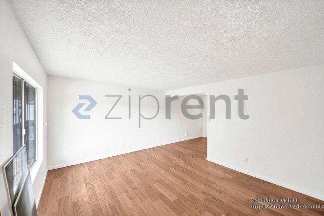 Building Photo - 2458 Normandie Ave