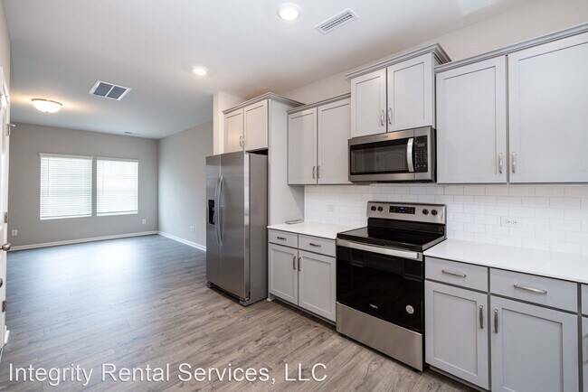 Building Photo - 3 br, 2.5 bath House - 104 S. Dorsett St