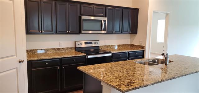 Foto del edificio - 709 Peach Tree Ln