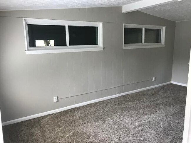Building Photo - Spacious 4 Bedroom Home With Garage And Modern Updates