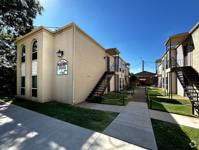 Paved Exterior on Stella St. - Pecan Grove Apartments