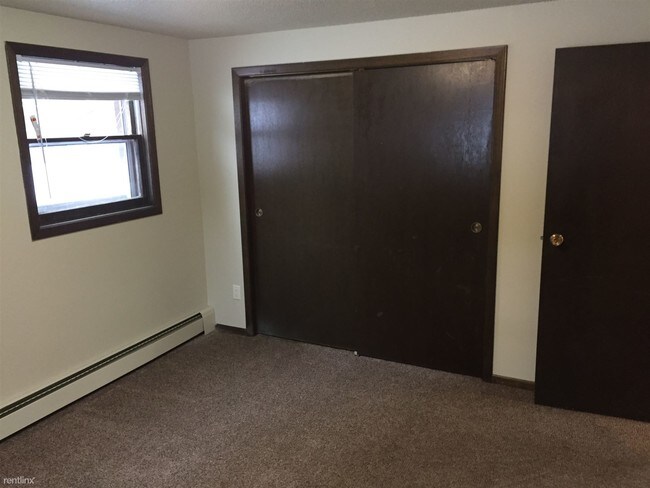 Building Photo - 2 br, 1 bath 4plex - 3405 E 28th St 2
