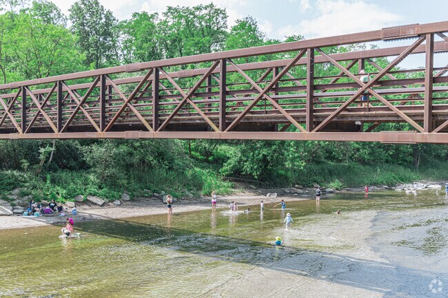 Locals often wade and play along the Chagrin River’s banks.
