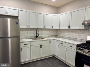 Building Photo - 2128 W 65th Ave