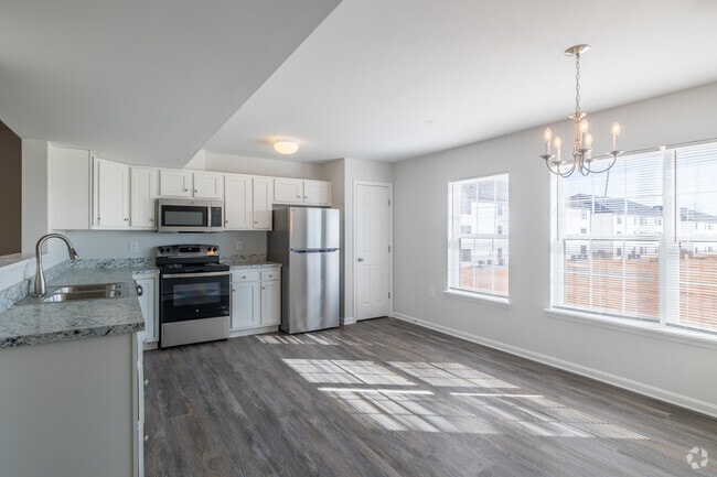 3BR, 2BA - 1,420SF - Kitchen - Smith Farm Apartments