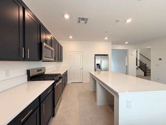 Building Photo - Brand-New 3-Story Home in Southern Highlands with 5 Bedrooms & Designer Kitchen