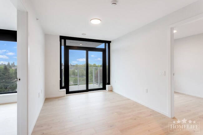 Photo du bâtiment - Brand New 2 Bed + Den Condo at FRAME in Norquay Village