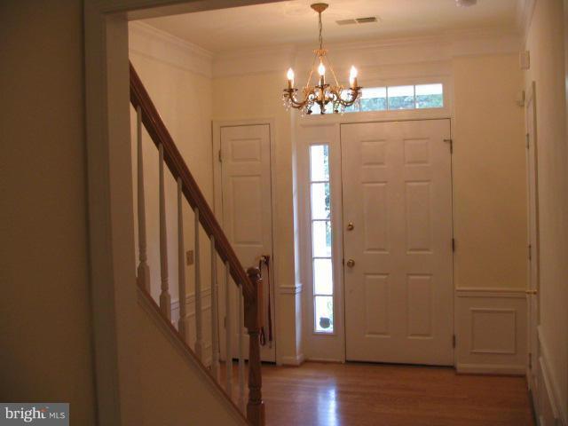 Building Photo - Effortless Living: Spacious Townhome with Wood Floors