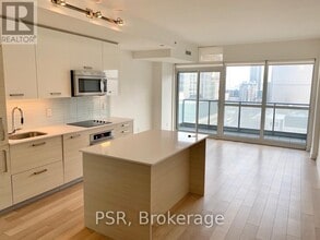 Building Photo - 210 Simcoe St