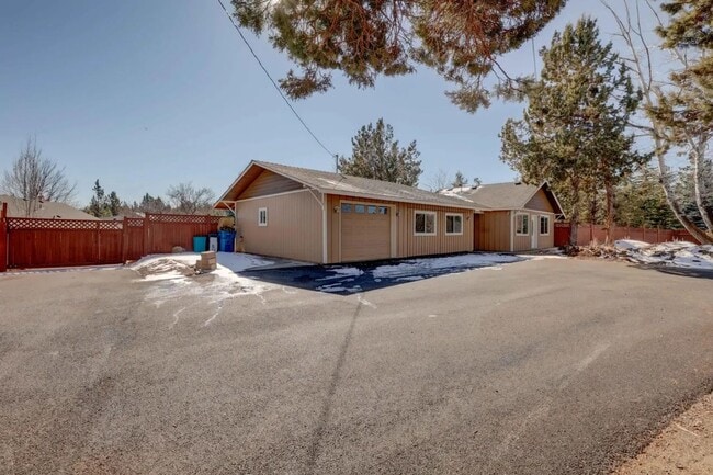 Building Photo - 1/2 acre in the with RV Hook ups