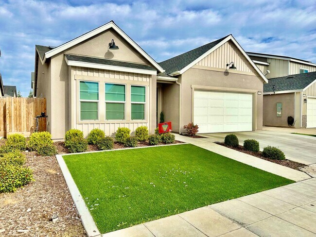 Foto del edificio - 3 br, 2 bath House - 5853 E Truman Ave