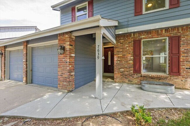 Building Photo - Spacious 4BR Home with Finished Basement, Private Yard & Community Amenities